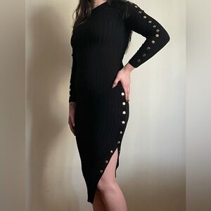 Black midi sweater dress with long sleeves and button up slit